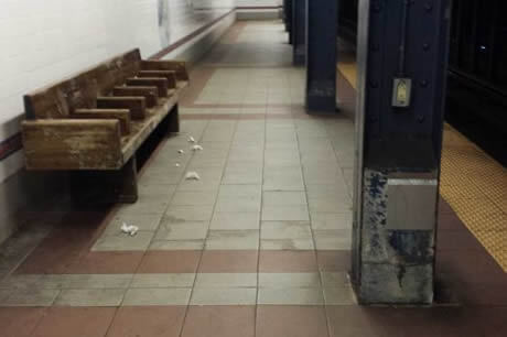 subway station with litter on ground
